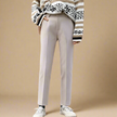 FJØRNA women's wool blend trousers, stylish and tailored pants with a classic fit, shown on a model with a neutral background.
