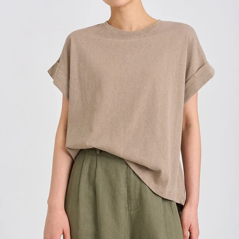 FJØRNA oversized tee with rolled cuffs, soft fabric, relaxed fit, and casual style, shown in a neutral color.