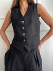 FJØRNA linen wide-leg women’s trousers, part of co-ord set, featuring relaxed fit and lightweight fabric for casual style.