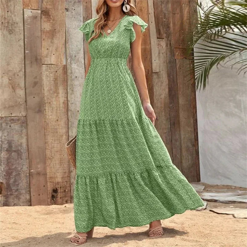 FJØRNA Tiffany tiered ruffle white maxi dress with flowing fabric and layered design, perfect for elegant summer occasions.