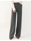Women’s FJØRNA Merino wool wide-leg joggers, cozy and stylish pants with a relaxed fit, shown in natural fabric and design.
