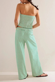 FJØRNA women's knit wide leg trousers from co-ord set, soft fabric, high-waisted, and relaxed fit, shown in a neutral color.