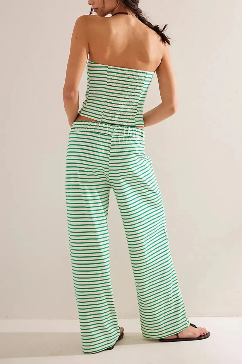 FJØRNA women's knit wide leg trousers from co-ord set, soft fabric, high-waisted, and relaxed fit, shown in a neutral color.