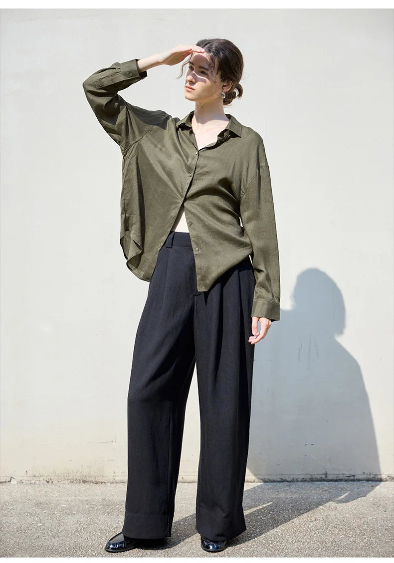 FJØRNA women's linen shirt, lightweight and breathable top in natural linen fabric, displayed on a neutral background.