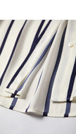Lacceti Maren Stripe Satin Blouse with long sleeves, button front, and elegant satin fabric featuring blue and white stripes.