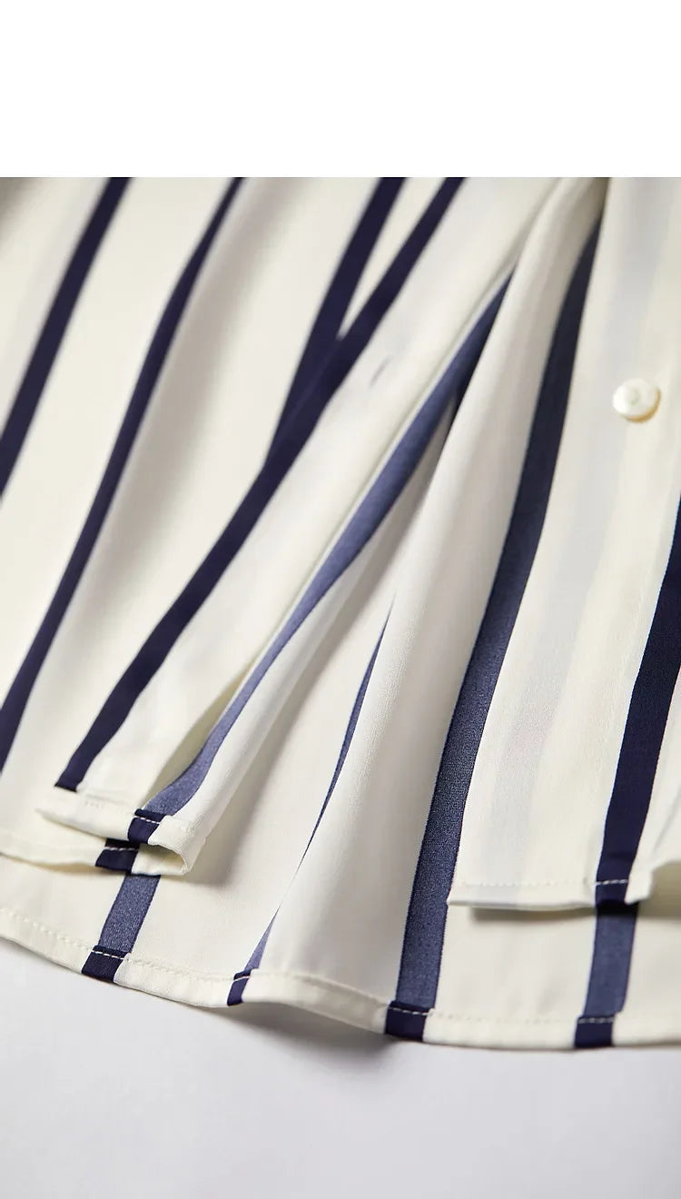 Lacceti Maren Stripe Satin Blouse with long sleeves, button front, and elegant satin fabric featuring blue and white stripes.