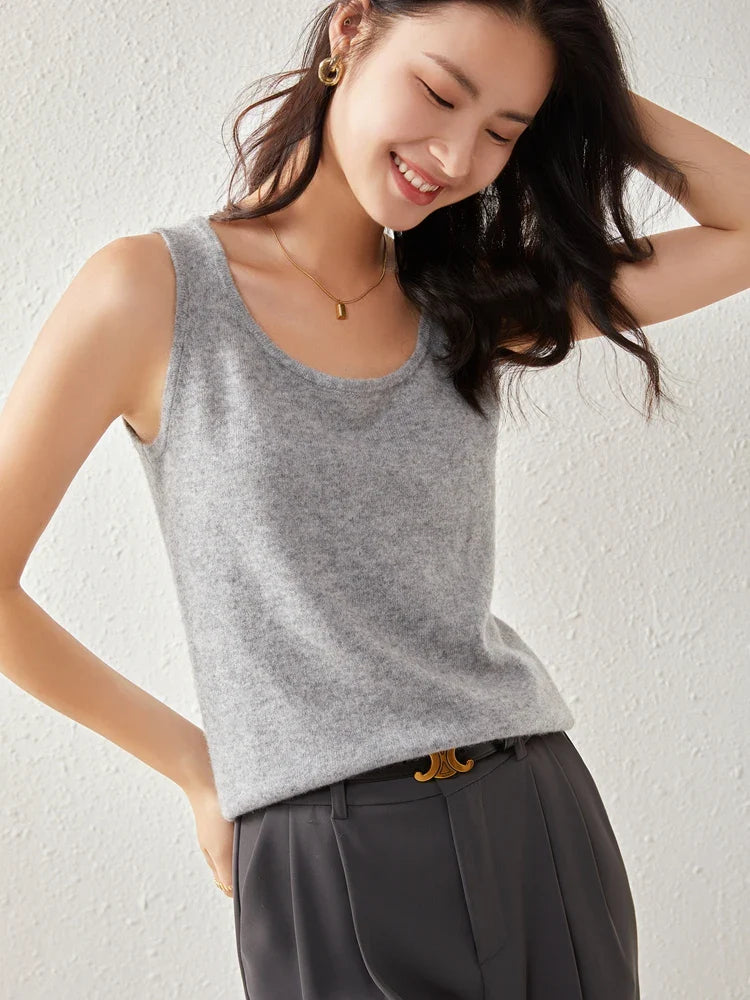 Women’s FJØRNA cashmere top featuring a soft, cozy design in a neutral color, perfect for stylish winter or fall outfits.