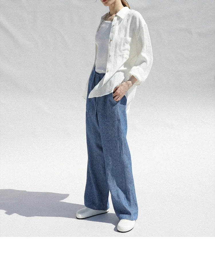 FJØRNA women's long sleeve linen blouse with a relaxed fit and natural fabric texture, perfect for casual or office wear.