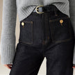 Women’s FJØRNA cotton wide leg high waist jeans, showcasing the relaxed fit and classic denim texture.