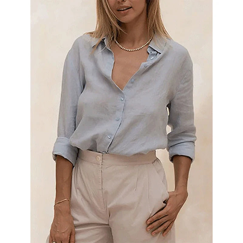 FJØRNA women's linen blouse, lightweight and airy tops for women, featuring relaxed fit and natural fabric in soft neutral tones.