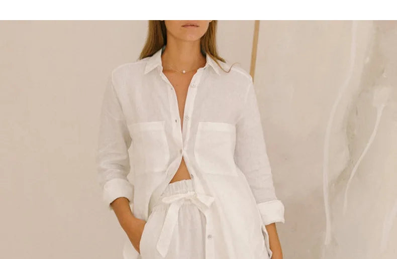 Women’s linen top with ruffle details by FJØRNA, featuring a lightweight, casual design perfect for spring and summer outfits.