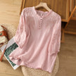 FJØRNA women's floral summer blouse with V-neck, linen fabric, and ruffle details, perfect for warm-weather casual wear.