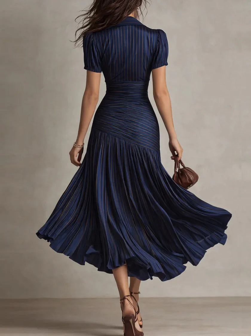 FJØRNA Zaffira White Pleated Midi Dress with flowing fabric and elegant midi length, perfect for stylish occasions.