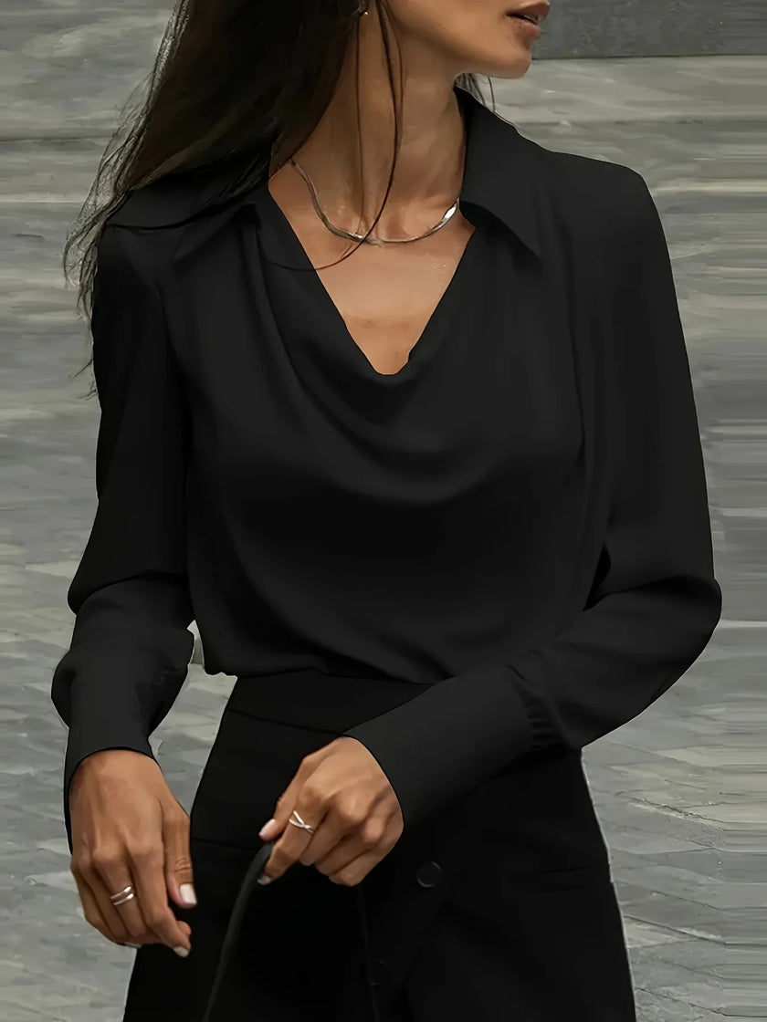 FJØRNA women's satin long sleeve shirt, elegant top with smooth fabric and tailored fit, worn with buttons and classic collar.