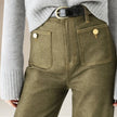 FJØRNA women's wide-leg cotton jeans with high waist, relaxed fit, and classic denim style in light blue.