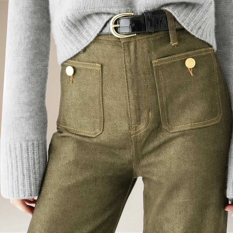 FJØRNA women's wide-leg cotton jeans with high waist, relaxed fit, and classic denim style in light blue.