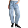 Women’s denim jeans with a barrel leg style by FJØRNA, showcasing classic blue denim fabric and relaxed fit.