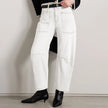 FJØRNA women's denim jeans with barrel leg style, showcasing a classic fit and durable indigo denim fabric.