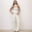FJØRNA women's silk halter neck top featuring a stylish design, smooth fabric, and elegant fit for a chic look