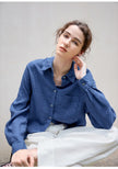 Women’s linen blend shirt by FJØRNA, showcasing a relaxed fit and lightweight fabric, perfect for casual or summer wear.