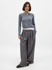 FJØRNA women's knit cardigan, soft and cozy top, featuring a button-up design and ribbed cuffs, ideal for casual layering.