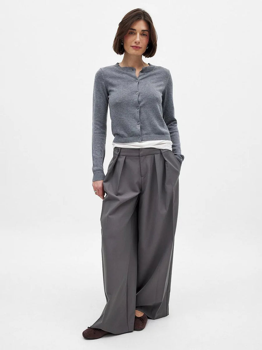 FJØRNA women's knit cardigan, soft and cozy top, featuring a button-up design and ribbed cuffs, ideal for casual layering.