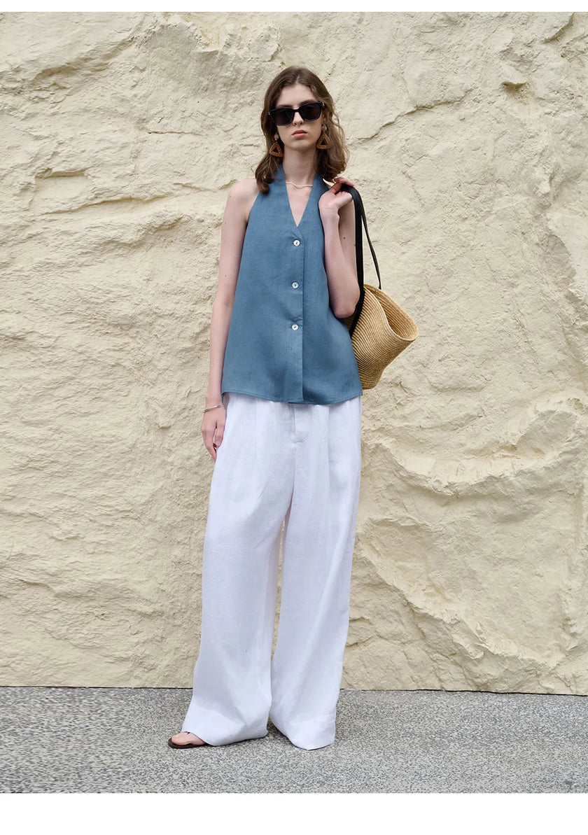 FJØRNA linen waistcoat for women with halter neck, sleeveless top, stylish and lightweight for warm weather.