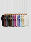 FJØRNA oversized tee with rolled cuffs, casual fit, soft fabric, featuring a relaxed style and comfortable design.