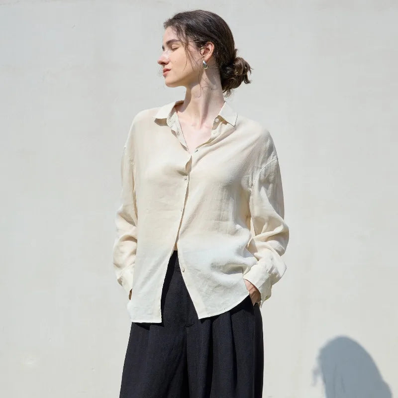 FJØRNA women's linen shirt, lightweight and breathable tops for women, featuring a relaxed fit and natural fabric texture.