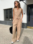 FJØRNA women's linen wide leg trousers, part of co-ord set, showcasing lightweight, flowy fabric and relaxed fit.