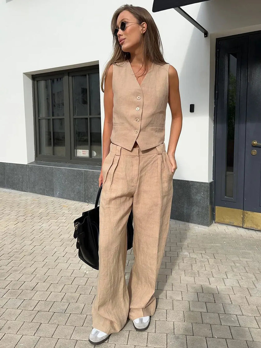 FJØRNA women's linen wide leg trousers, part of co-ord set, showcasing lightweight, flowy fabric and relaxed fit.