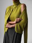 FJØRNA sleeveless wool vest for women, stylish and warm, showcasing a close-up of the soft, cozy wool fabric and fitted design.