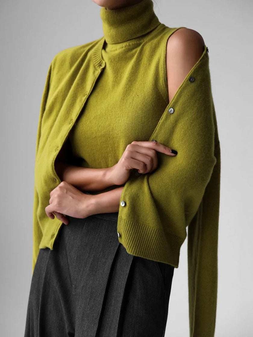 FJØRNA sleeveless wool vest for women, stylish and warm, showcasing a close-up of the soft, cozy wool fabric and fitted design.