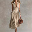 FJØRNA Martina elegant flowy midi dress in soft fabric, featuring a graceful silhouette and stylish design.