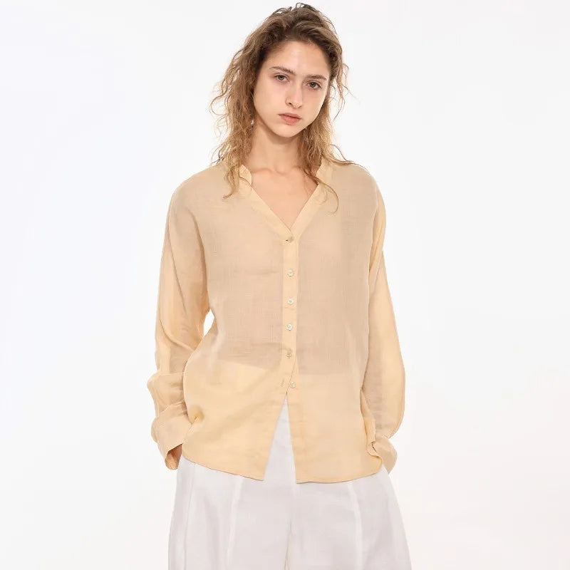 FJØRNA women's linen V-neck shirt, lightweight and breathable top with a relaxed fit, perfect for casual wear.