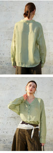 FJØRNA women's linen V-neck shirt, lightweight and breathable, shown in a natural relaxed fit with short sleeves and soft fabric.