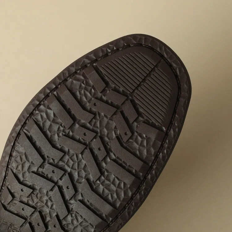 FJØRNA women's Italian leather sandals with adjustable straps, featuring a stylish open-toe design and comfortable flat sole.
