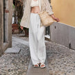 FJØRNA women's knit top, close-up of soft, textured fabric with a fitted style and ribbed neckline for casual elegance.
