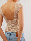 FJØRNA women's mesh top featuring a lightweight, breathable design with a stylish, semi-sheer fabric ideal for layered fashion.