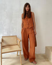 FJØRNA women's linen wide-leg trousers from co-ord set, relaxed fit pants with breathable fabric and stylish design.