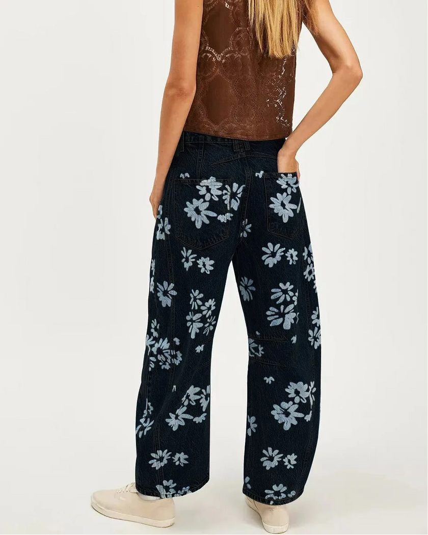 FJØRNA women's wide-leg denim jeans, stylish pants with a relaxed fit and classic blue wash, displayed on a neutral background.
