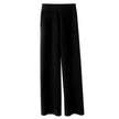 FJØRNA women's joggers, stylish and comfortable pants for women, shown in a relaxed fit with a drawstring waist and tapered legs.