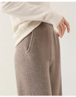 Women’s Merino wool joggers by FJØRNA, wide-leg pants with a cozy, soft knit texture and relaxed fit, perfect for casual wear.