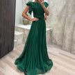 FJØRNA Abigail white pleated evening dress with flowing fabric and elegant design, perfect for formal occasions.