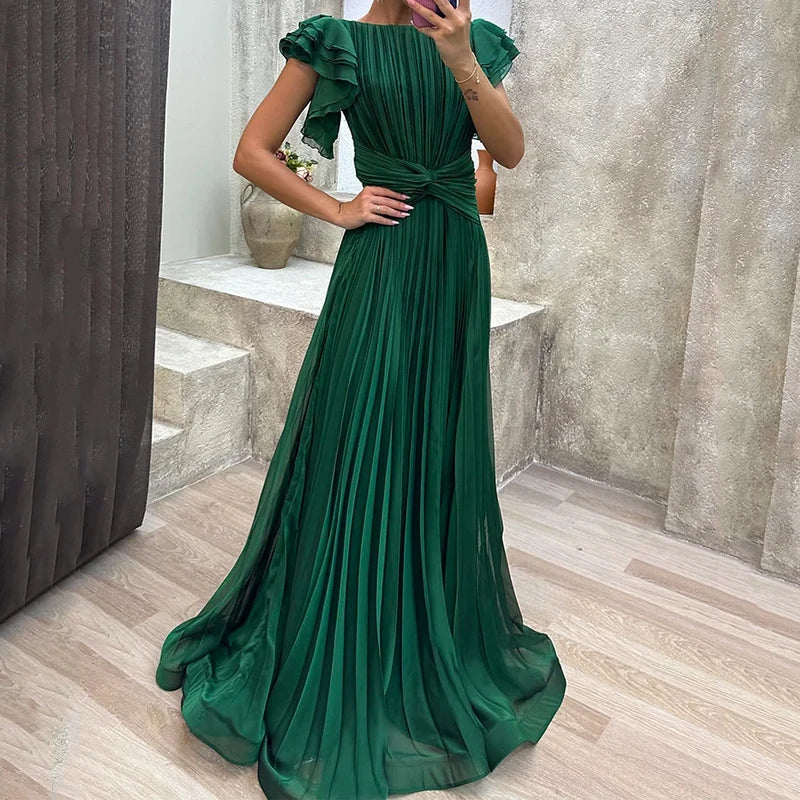 FJØRNA Abigail white pleated evening dress with flowing fabric and elegant design, perfect for formal occasions.