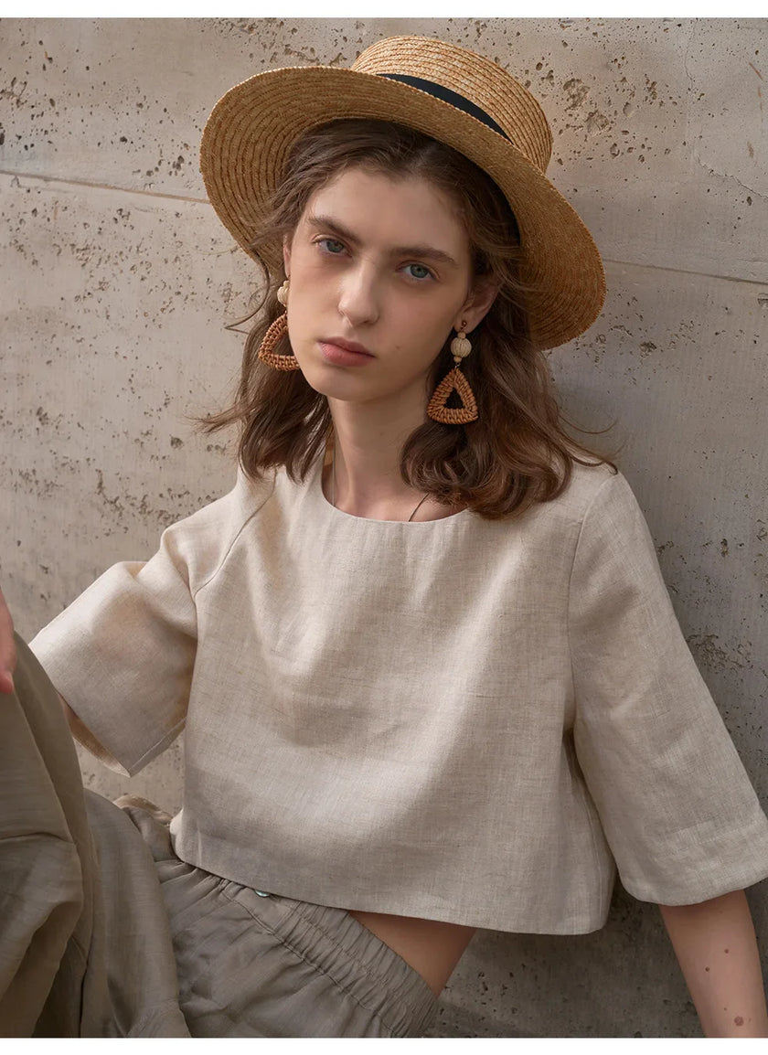 FJØRNA linen crop top for women with short sleeves, lightweight and stylish for casual summer wear.