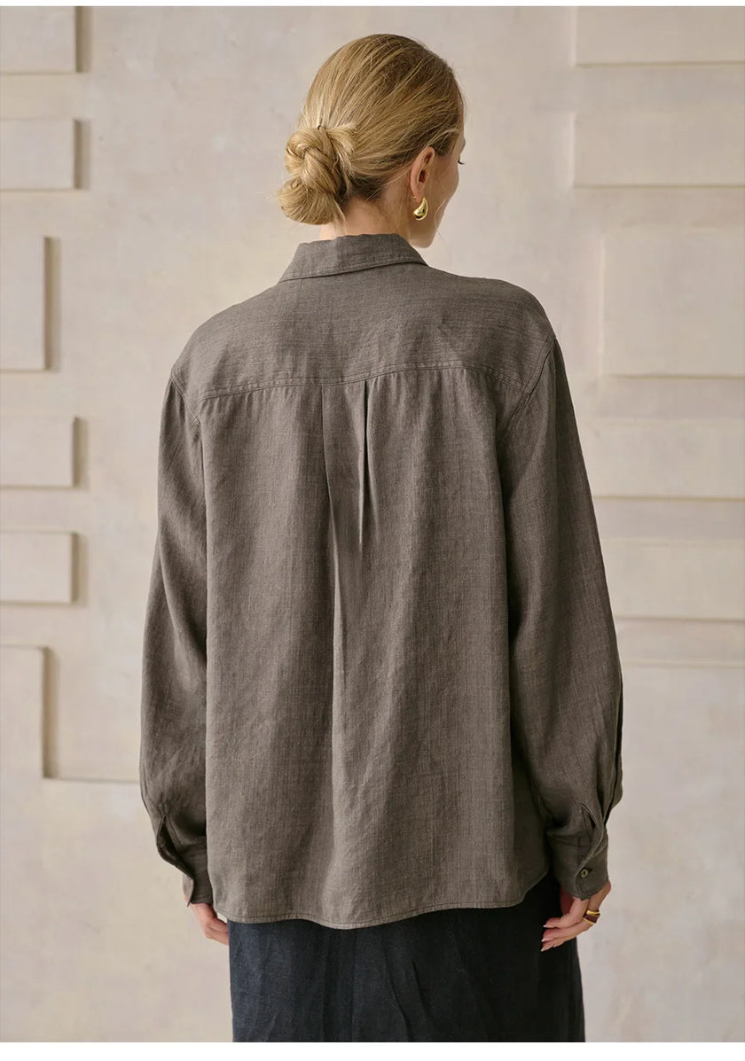 FJØRNA women's linen blend shirt, stylish and lightweight top with a relaxed fit, shown in a natural fabric texture.