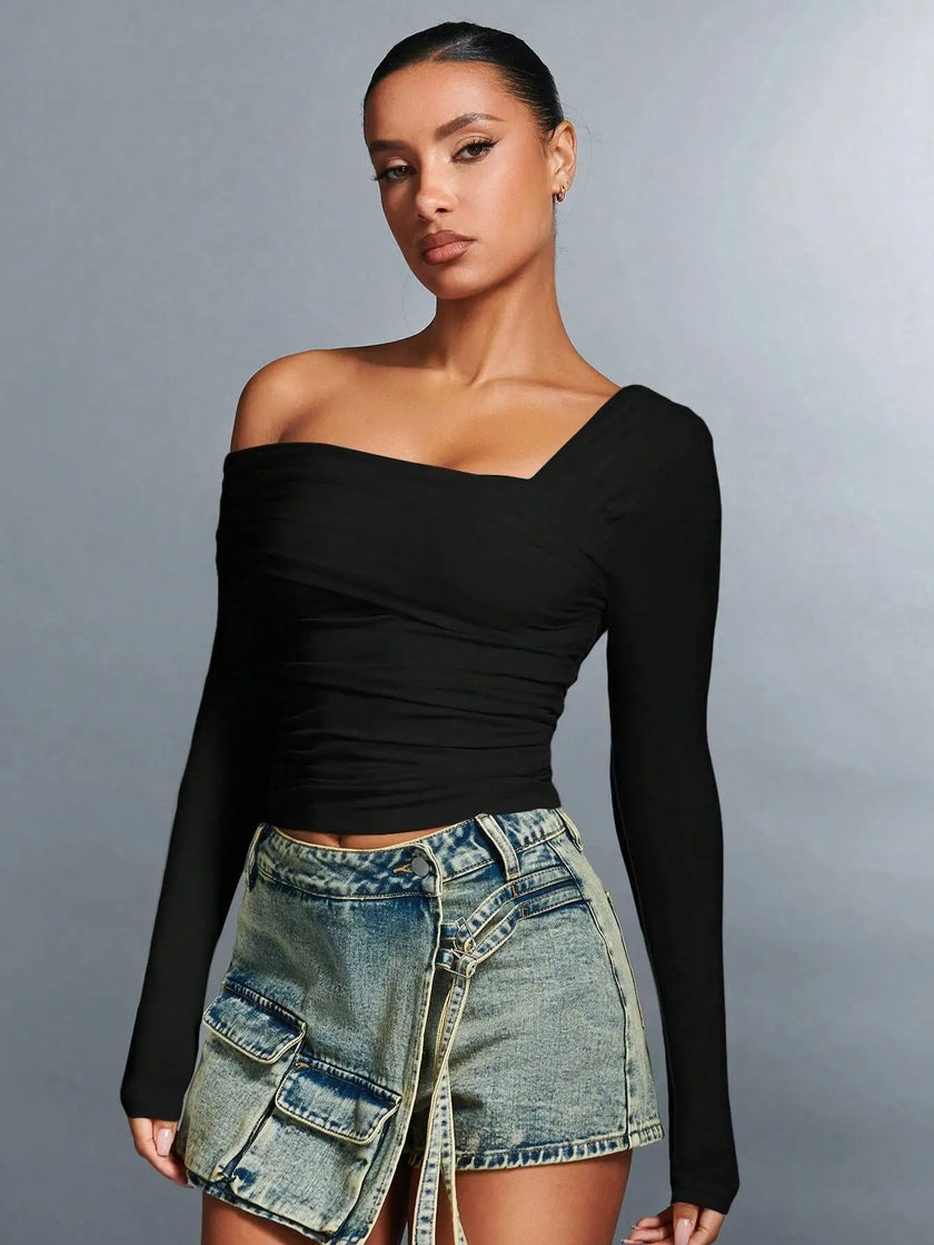 FJØRNA women's off-shoulder cotton top with a relaxed fit, featuring a stylish neckline and lightweight fabric.