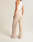 Women's wide-leg high-waist trousers by FJØRNA, stylish pants with a relaxed fit and modern silhouette.