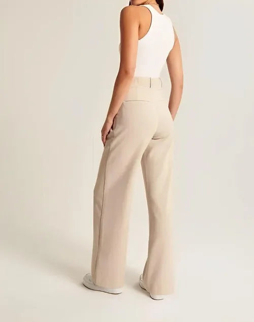 Women's wide-leg high-waist trousers by FJØRNA, stylish pants with a relaxed fit and modern silhouette.